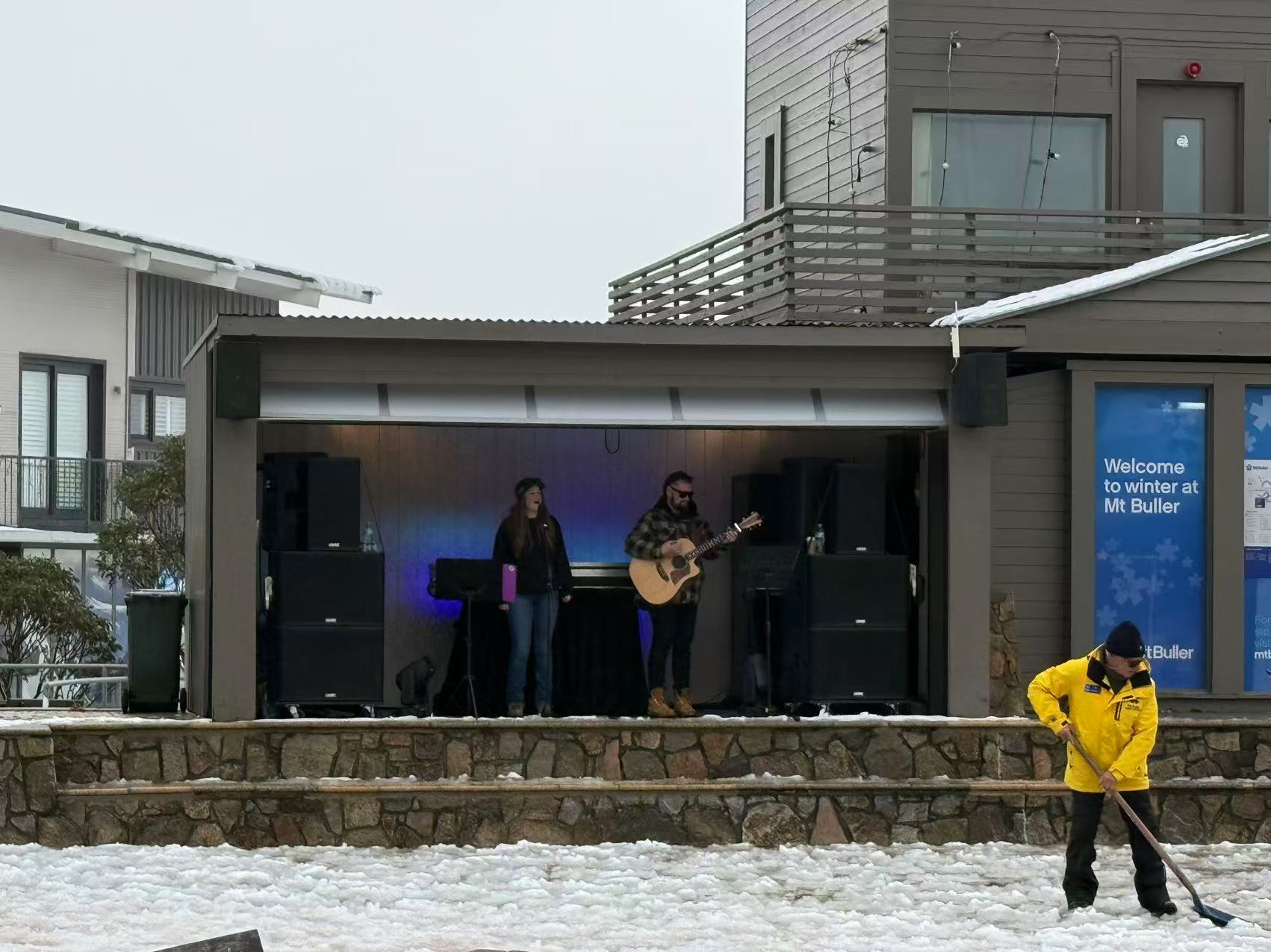 Live music performance at Mt Buller village on snow season opening weekend